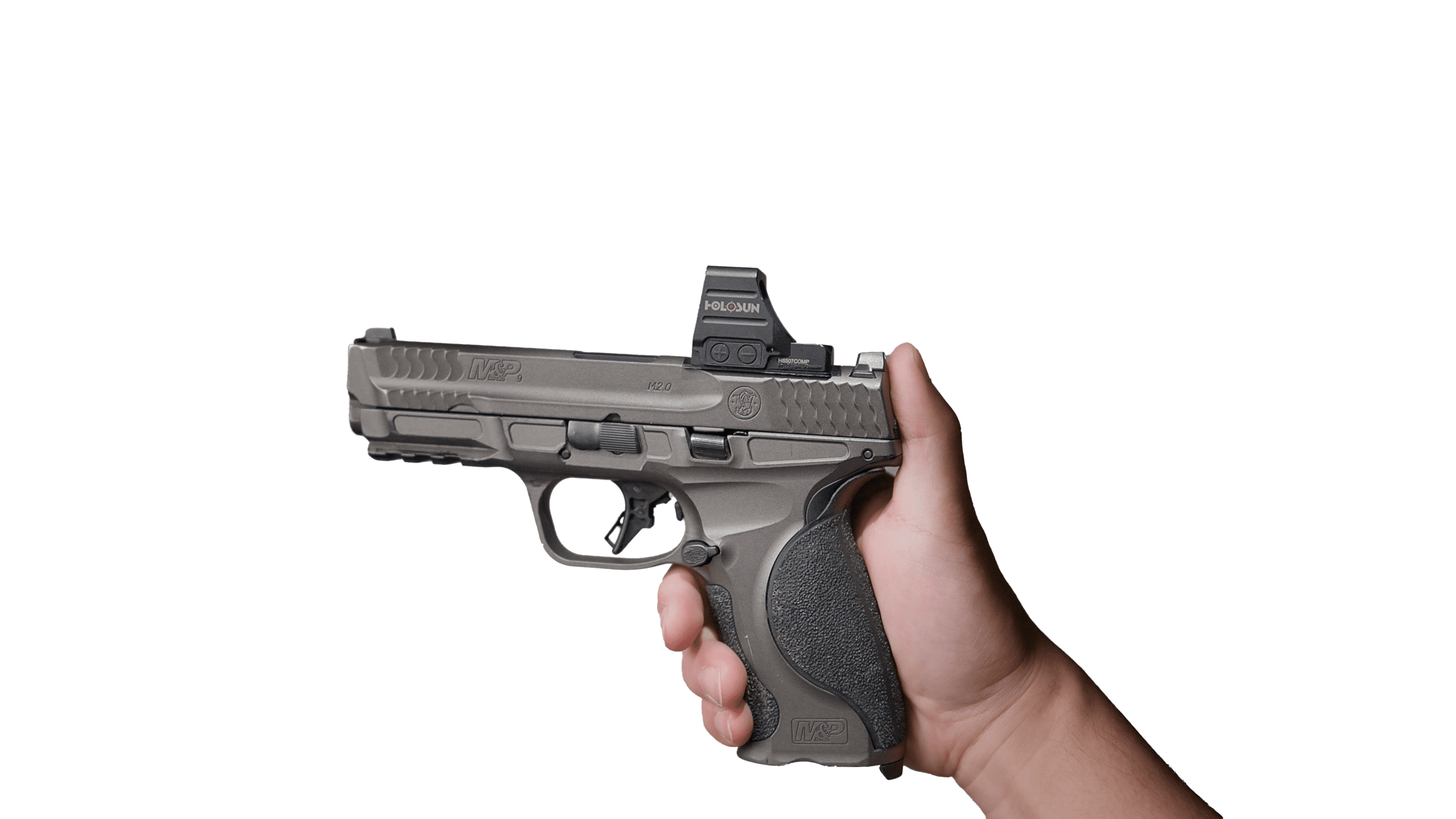 Hand holding a pistol with a red dot optic